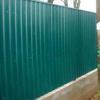 How to build a fence from corrugated board on a slope Laying the foundation and installing pillars